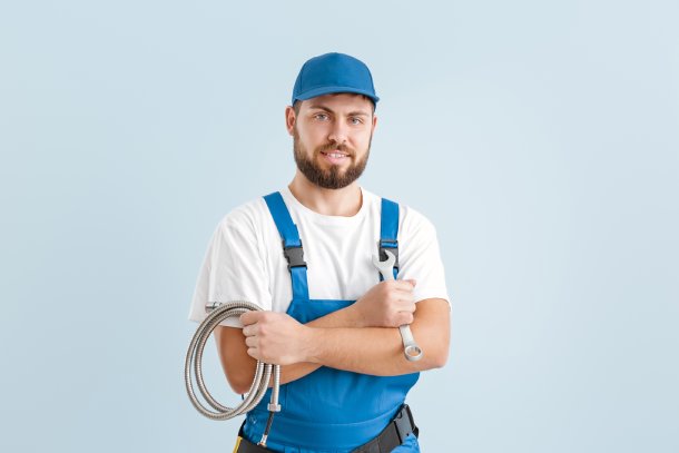Technician standing in home kitchen